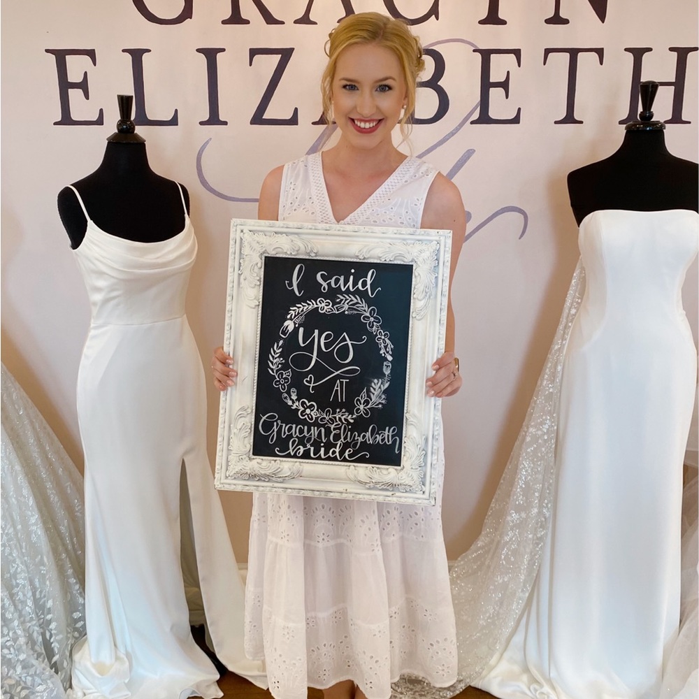 Bridal white eyelet midi dress.